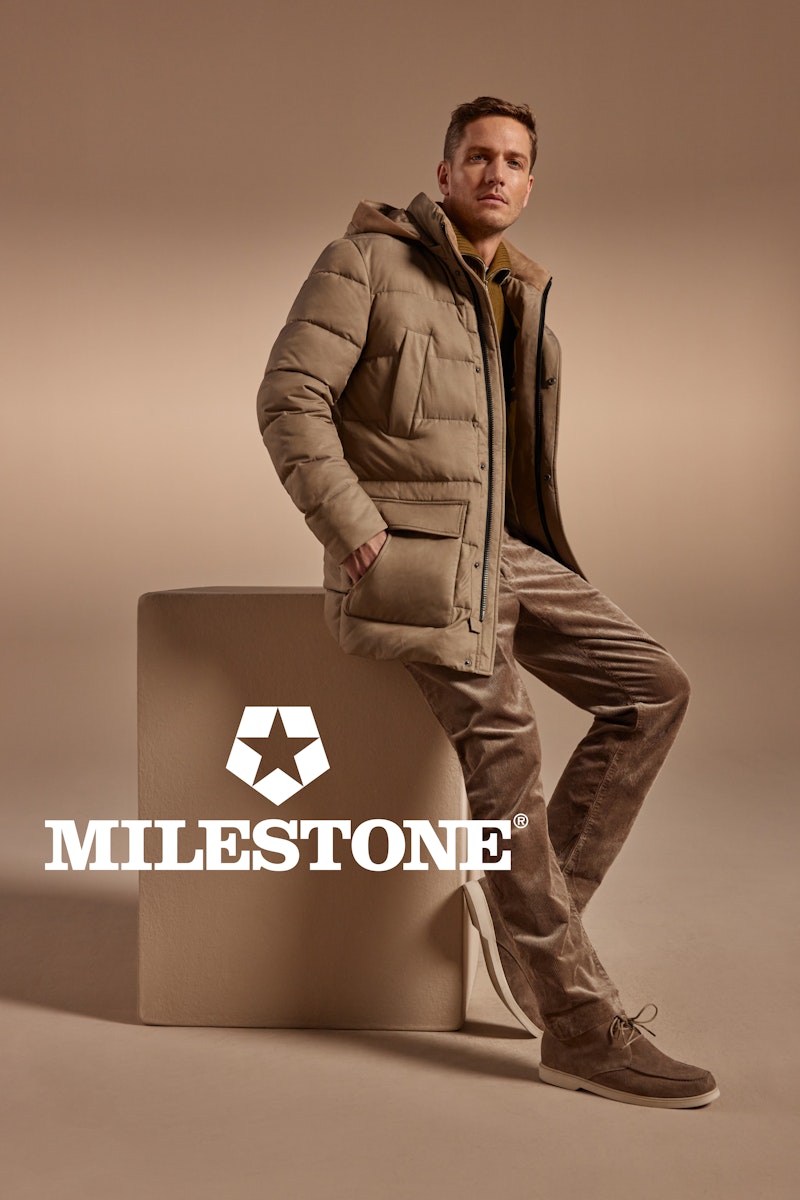 casual herenoutfit CP Company met jeans en jack