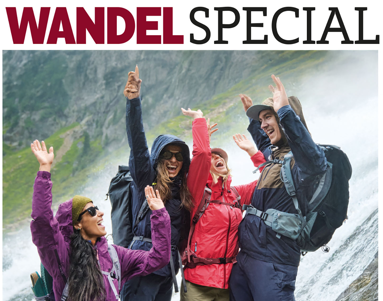 4 juichende mensen in winterkleding