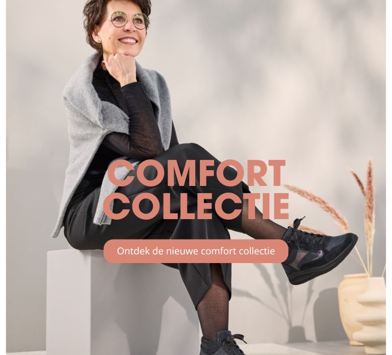 Zittende dame met zwarte hoge comfortsneakers